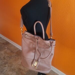 Gently used, no tears or rips, Rose colored shoulder bag